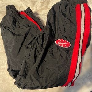 Nike Basketball wind breaker pants.